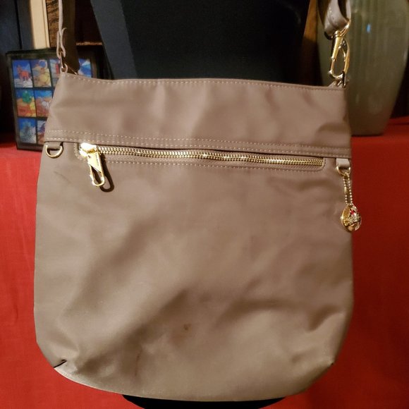 Travelon Handbags - Travelon tan crossbody travel bag